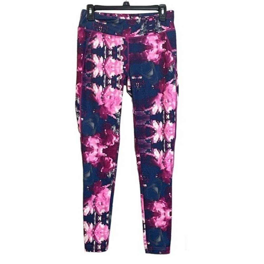 The North Face athletic leggings. Blue and pink pixelated. Women’s size S/P